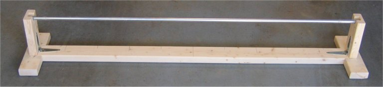 Rocket airframe tube wrapping jig